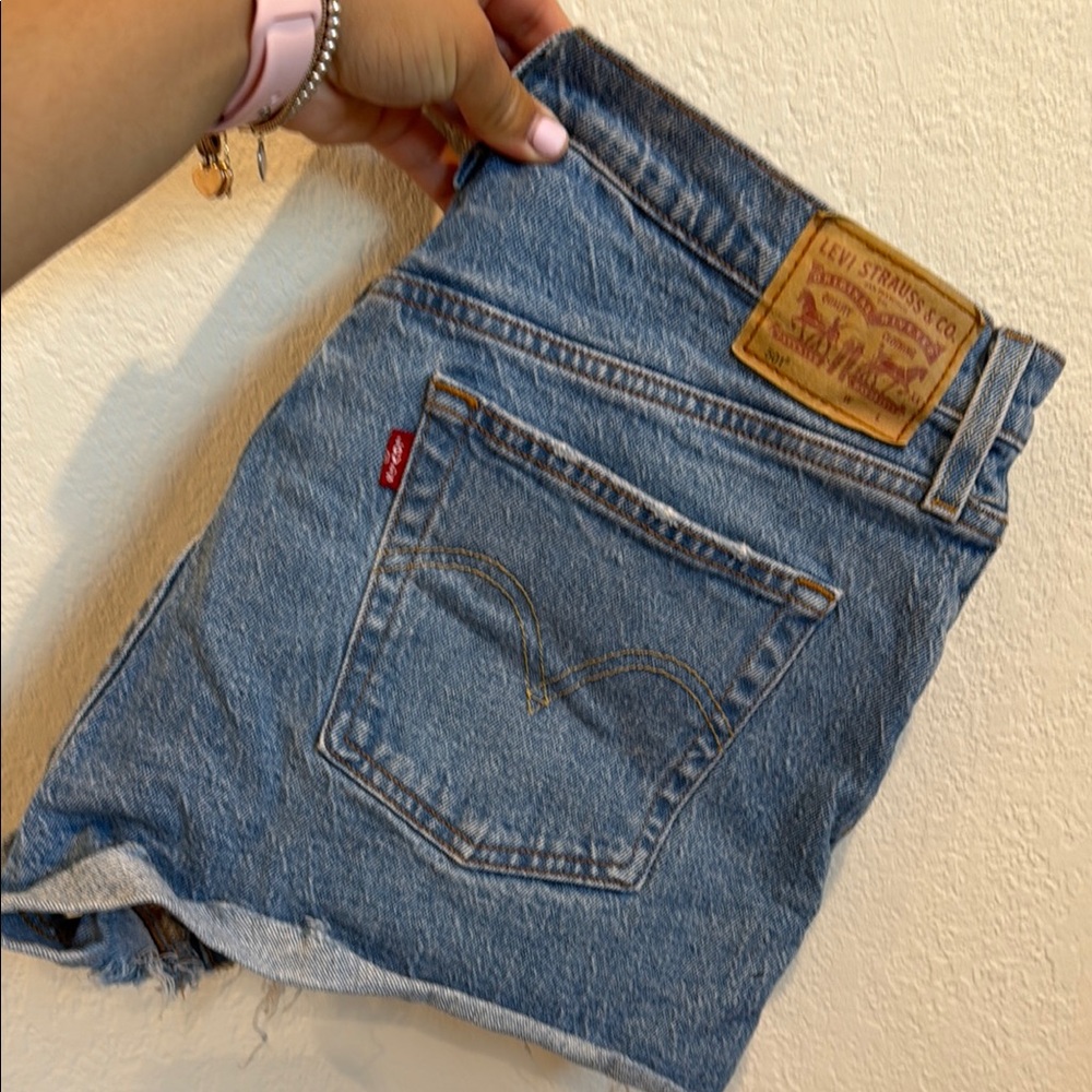 Levi's Blue Jean Shorts with Frayed Hem and High-Waisted Fit